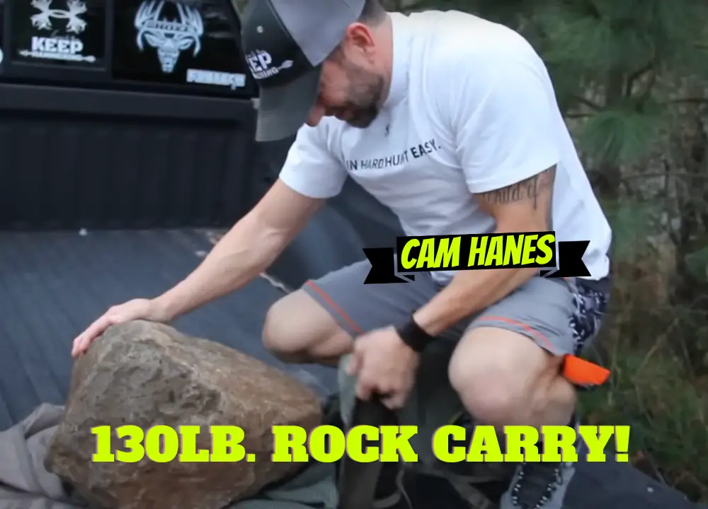 Cameron Hanes With his 130 pound rock, putting it in a Tenzing backpack.